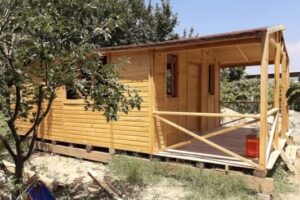 ağaçlar arasında tek katlı "2. El ahşap bağ evi"